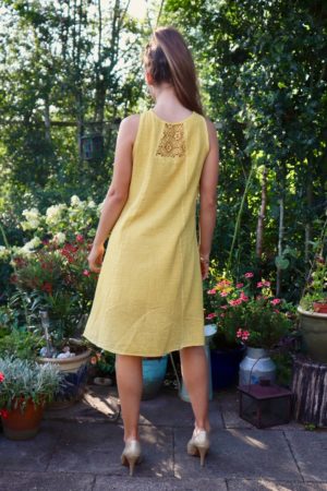 Trendy yellow midi dress with laces at the back - soft cotton quality. Ethnic inspired