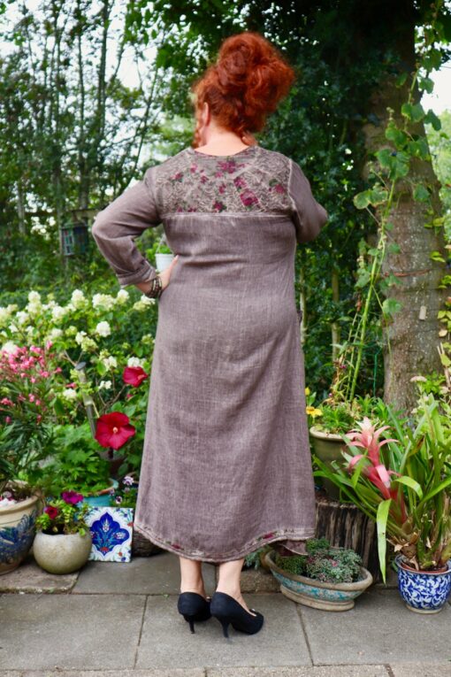 Long dress in coffee brown with laces, embroidery and floral prints on the back