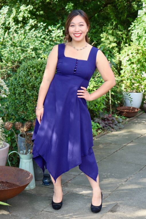 Elegant dress in blue made from soft natural cotton. Asymmetrical cutting in 2 layers. Perfect for a night out.