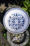 A handmade bowl in white with blue and turqouise floral motifs, in Ottoman style. Lead free and food safe