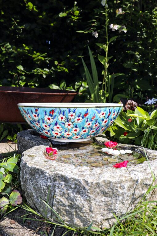 Colorful handmade ceramic bowl illustrated with the tree of life
