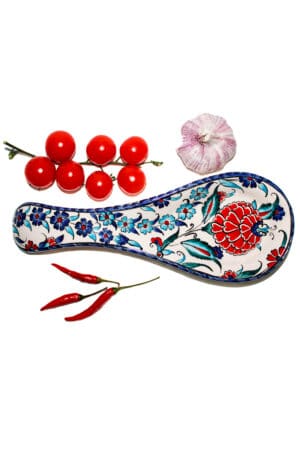 Smart for cooking. Practical and decorative spoon rest with floral motifs in blue, red white and turquoise colors. Leadfree