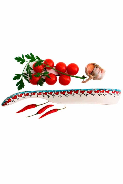 Side of ceramic spoon rest ideal for keeping cutlery. Handmade quality with a decorated border