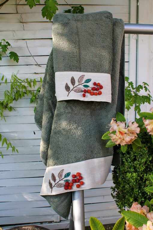 Unique towel set in dusty olive-green with gorgeous handmade embroideries and pompons